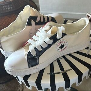 Source Unknown White and Black Athletic Shoes with Red  striped .
